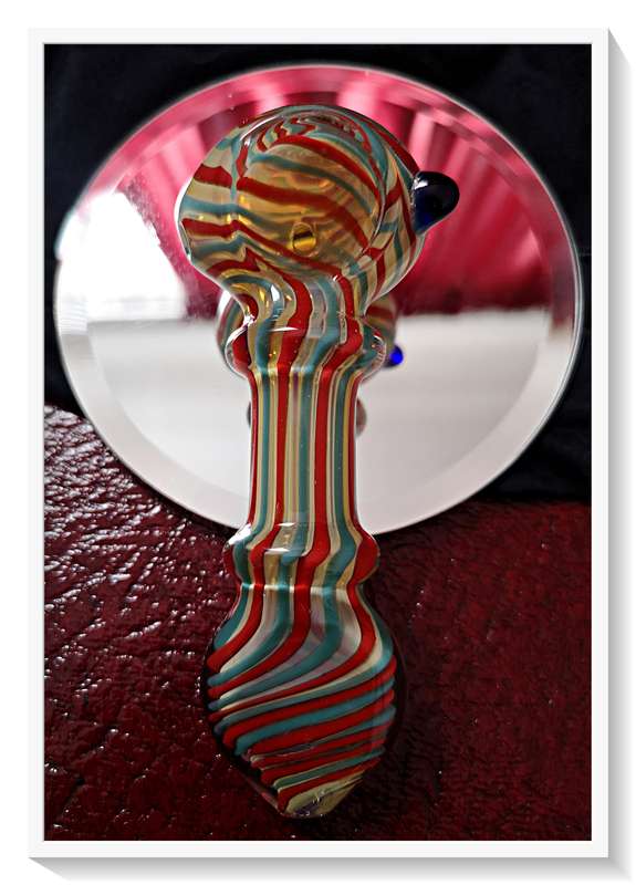 The Candy Twister is a Stunning Murano Styled Glass Pipe for Tobacco Smokers and Glass Collectors