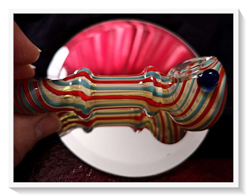 The Candy Twister is a Stunning Murano Styled Glass Pipe for Tobacco Smokers and Glass Collectors