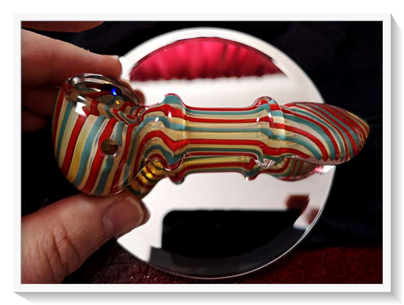The Candy Twister is a Stunning Murano Styled Glass Pipe for Tobacco Smokers and Glass Collectors