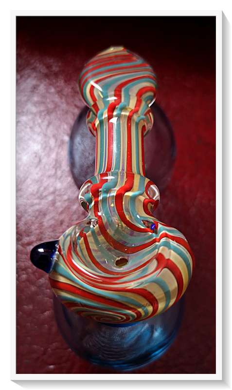 The Candy Twister is a Stunning Murano Styled Glass Pipe for Tobacco Smokers and Glass Collectors