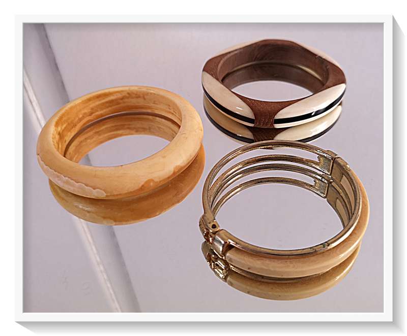 Three Ivory Toned Bangles made from Horn and Wood and Polished Resin