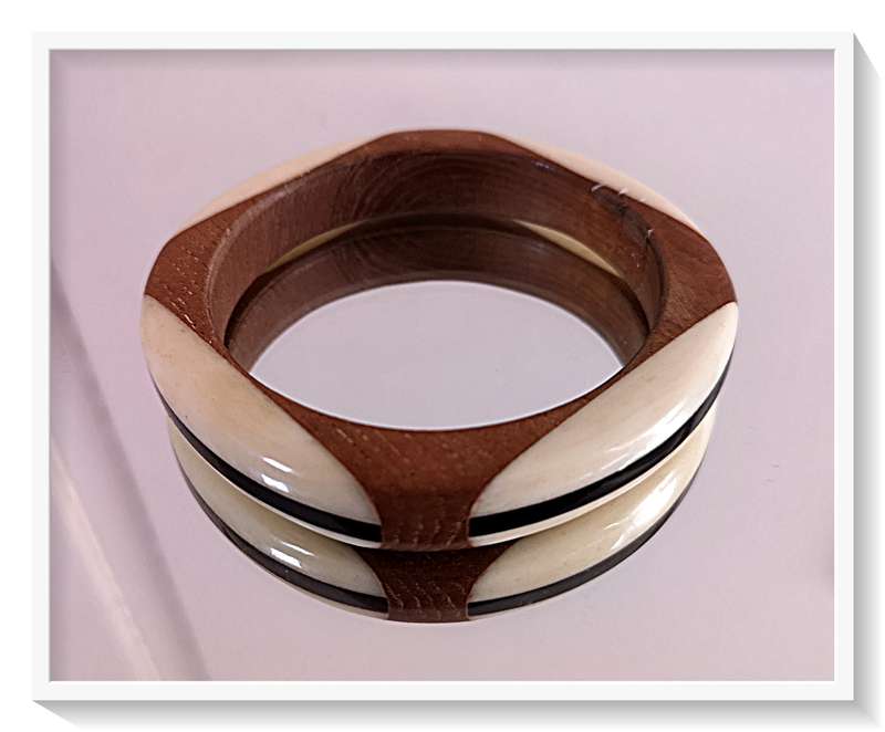 Three Ivory Toned Bangles made from Horn and Wood and Polished Resin