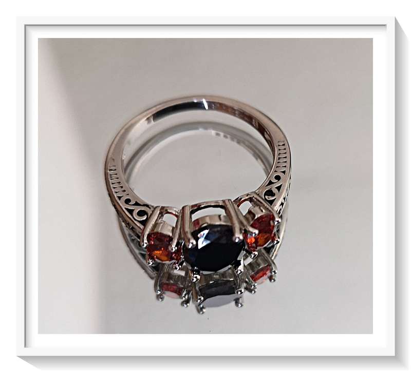 Genuine 925 Sterling ring with Dark Blue Zircon as the Primary Stone - Size 8 - Makes a Lovely Gift