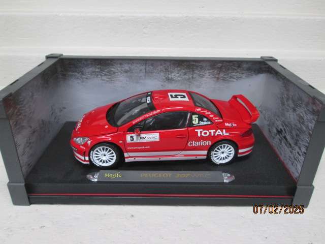 1:18 SCALE - DIE CAST - MAISTO - PEUGEOT 307 WRC RALLY CAR - BOXED