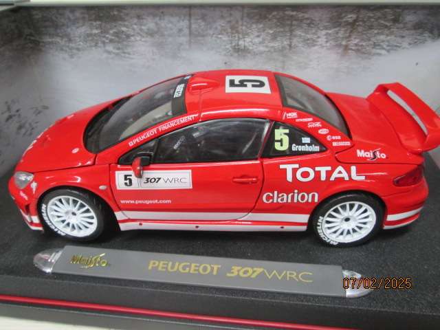 1:18 SCALE - DIE CAST - MAISTO - PEUGEOT 307 WRC RALLY CAR - BOXED