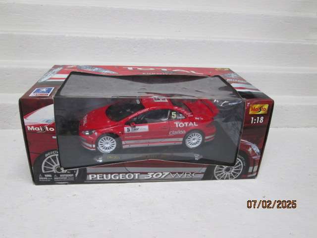 1:18 SCALE - DIE CAST - MAISTO - PEUGEOT 307 WRC RALLY CAR - BOXED