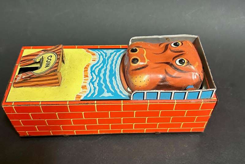 Tin plate wind up money bank made in Japan