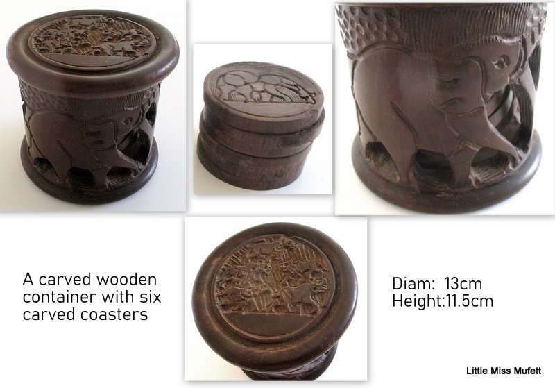 A CARVED WOODEN CONTAINER,A PAIR OF TREEN BOXES IN THE FORM OF FEET AND 2 OTHER CONTAINER