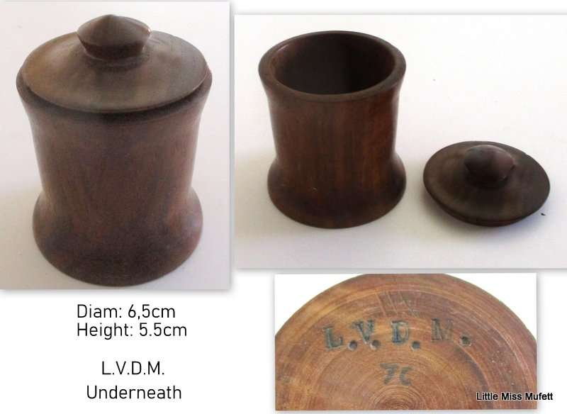 A CARVED WOODEN CONTAINER,A PAIR OF TREEN BOXES IN THE FORM OF FEET AND 2 OTHER CONTAINER