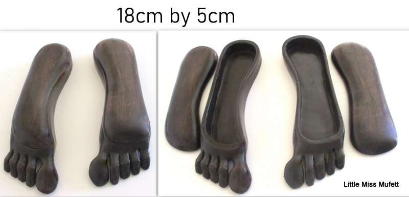 A CARVED WOODEN CONTAINER,A PAIR OF TREEN BOXES IN THE FORM OF FEET AND 2 OTHER CONTAINER