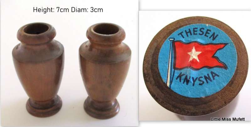 A CARVED WOODEN CONTAINER,A PAIR OF TREEN BOXES IN THE FORM OF FEET AND 2 OTHER CONTAINER