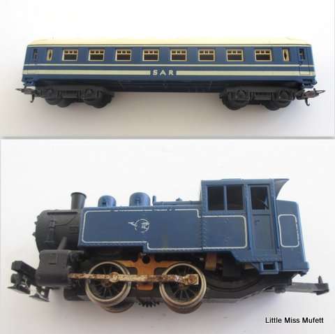 A Lima SAR blue train locomotive and a carriage