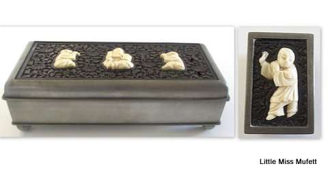 AN interesting Chinese card or cigar box with a matching match box holder