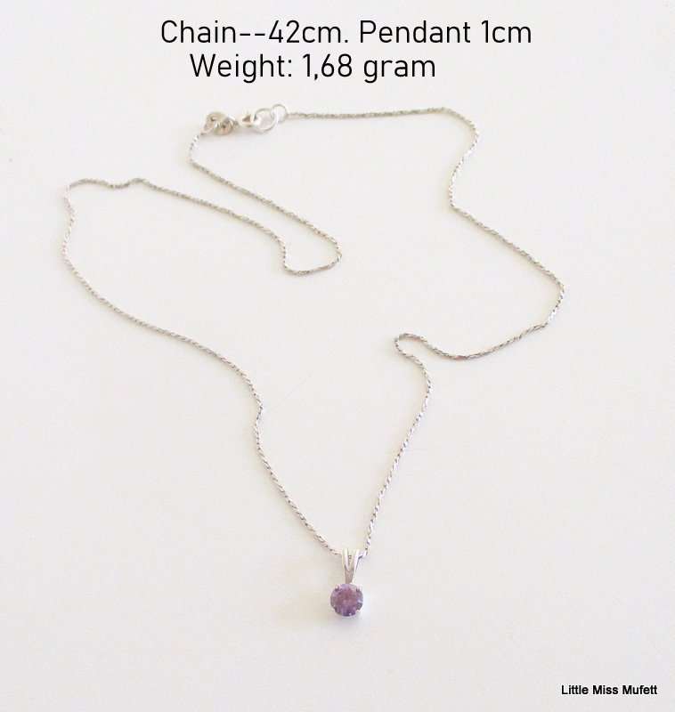 An Amber Sterling silver pendant and a dainty Sterling silver pendant on chain-Total weight  6, 37 g