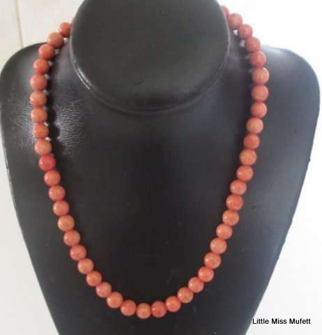 Vintage genuine Coral necklace on a gold tone clasp