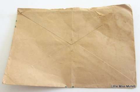 A BOER WAR POSTCARD ,AN OMDURHAM WAR POSTCARD AND A WAR ENVELOPE