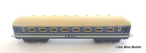 A Lima SAR blue train locomotive and a carriage