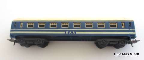 A Lima SAR blue train locomotive and a carriage