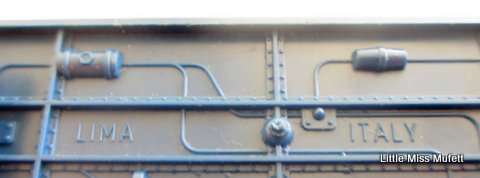 A Lima SAR blue train locomotive and a carriage