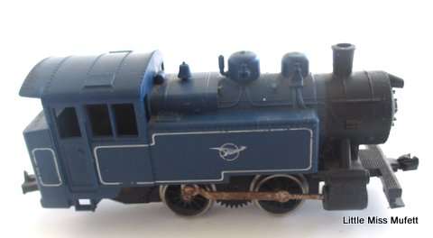 A Lima SAR blue train locomotive and a carriage