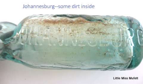 An antique codd bottle with original marble from Johannesburg