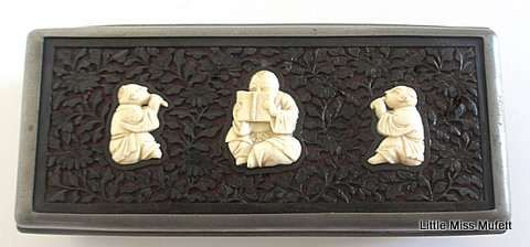 AN interesting Chinese card or cigar box with a matching match box holder