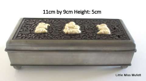 AN interesting Chinese card or cigar box with a matching match box holder