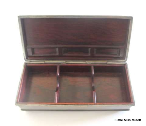 AN interesting Chinese card or cigar box with a matching match box holder