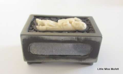 AN interesting Chinese card or cigar box with a matching match box holder
