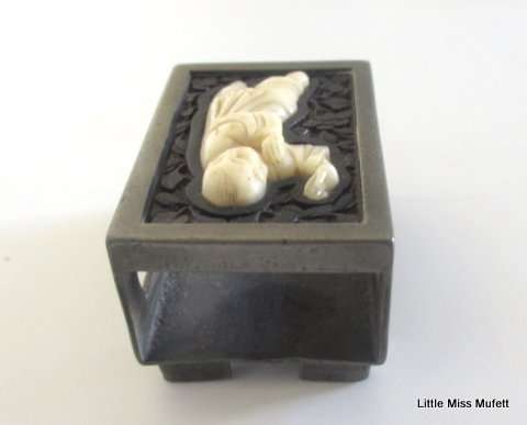 AN interesting Chinese card or cigar box with a matching match box holder