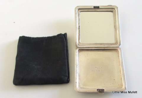 A hallmarked silver powder compact with original powder puff---83 Gram