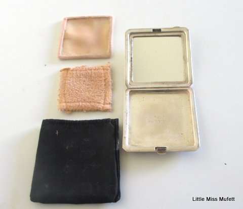 A hallmarked silver powder compact with original powder puff---83 Gram