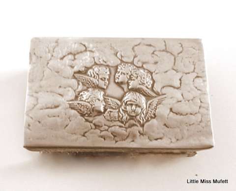 AN ART NOUVEAU MATCHBOX HOLDER--SILVER PLATED
