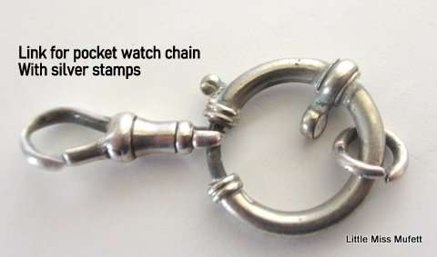 3 Sterling silver items. A Link for a pocket watch chain and 2 marcasite brooches--Total 17 Gram