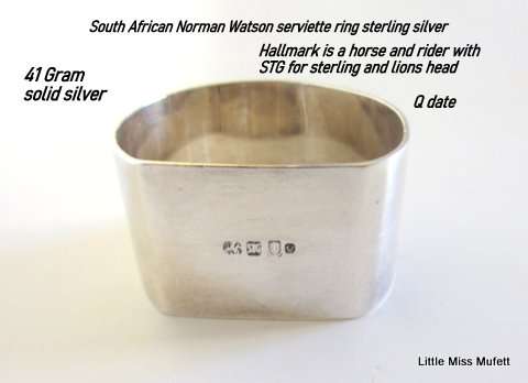 An interesting Sterling silver South African Norman Watson serviette ring.  41 Gram