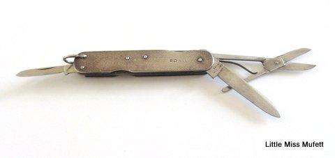 A Hallmarked silver pocket knife 1936.-The outer casing hallmarked