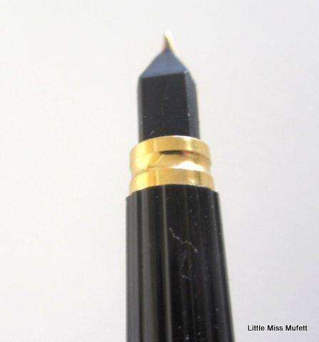 A Waterman fountain pen with an 18ct gold nib  and a full set of cartridges ,with booklets etc