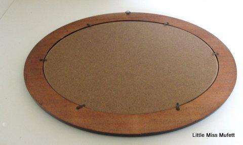 An Oval frame--48cm by 38cm