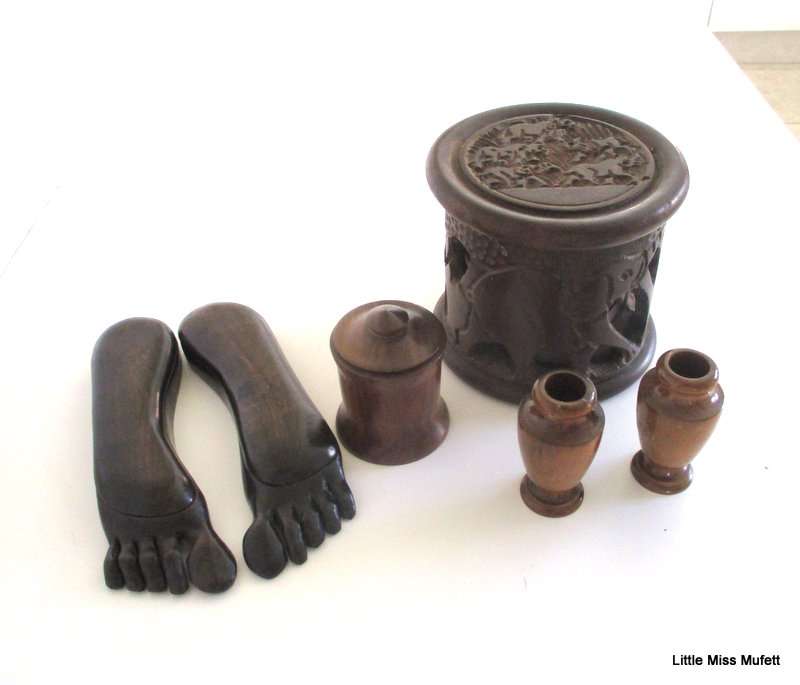 A CARVED WOODEN CONTAINER,A PAIR OF TREEN BOXES IN THE FORM OF FEET AND 2 OTHER CONTAINER