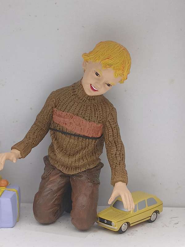 SCHUCO Piccolo 2003 Boy with VW Golf I limited to only 1,000 pieces