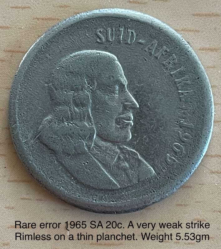 Rare error 1965 SA 20 cents. A very weak strike on a rimless thin planchet. See with photos