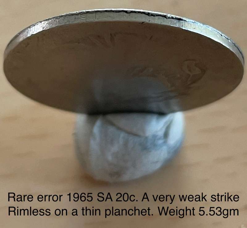 Rare error 1965 SA 20 cents. A very weak strike on a rimless thin planchet. See with photos