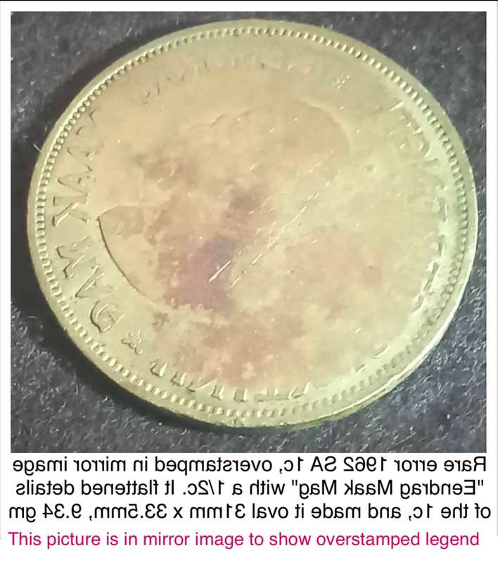 Unique error 1962 1c overstamped in mirror image with a half cent. Also oval, not round.
