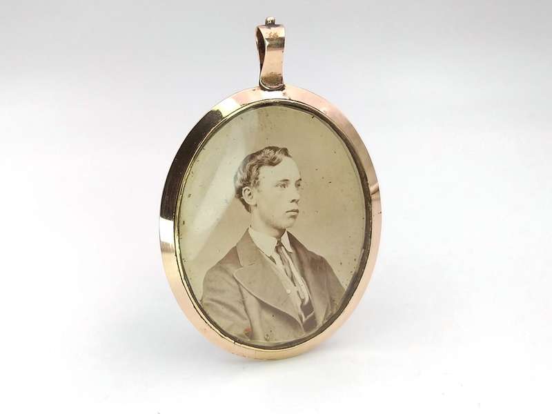 Georgian rolled gold photo locket with midnight blue glass