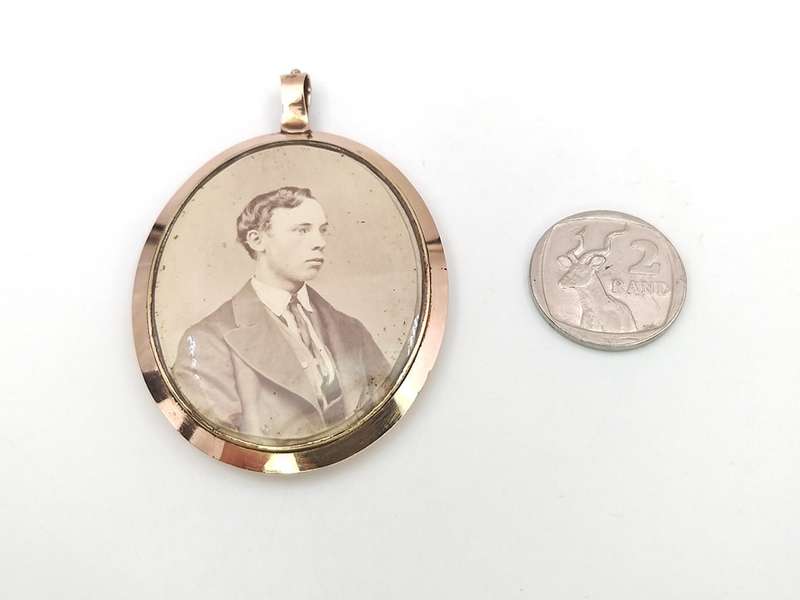 Georgian rolled gold photo locket with midnight blue glass
