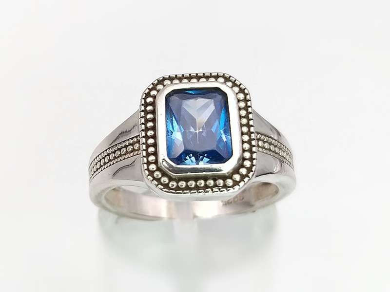 Sterling siler & blue topaz ring