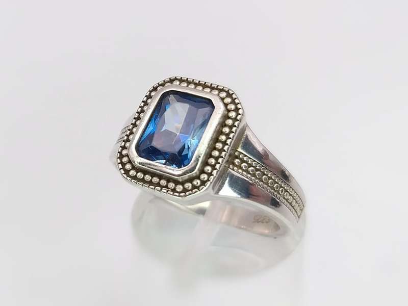 Sterling siler & blue topaz ring