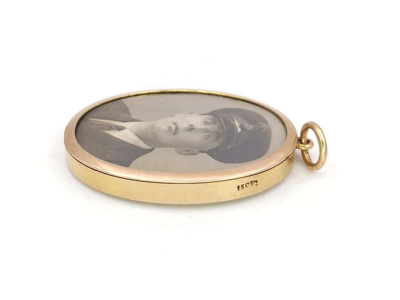 Antique 15ct gold double sided locket