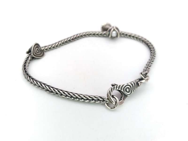 Sterling silver Trollbeads bracelet with two charms