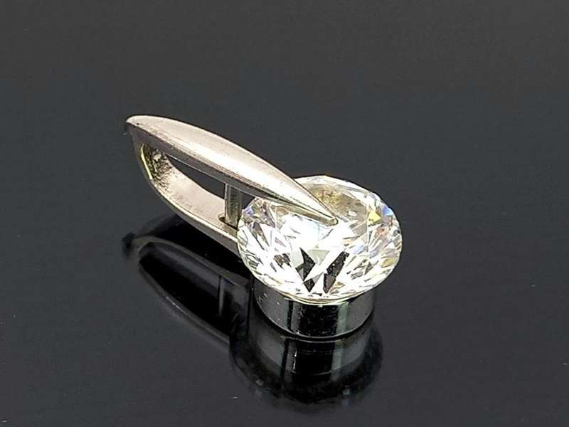 Modernist white gold and sparkly CZ pendant